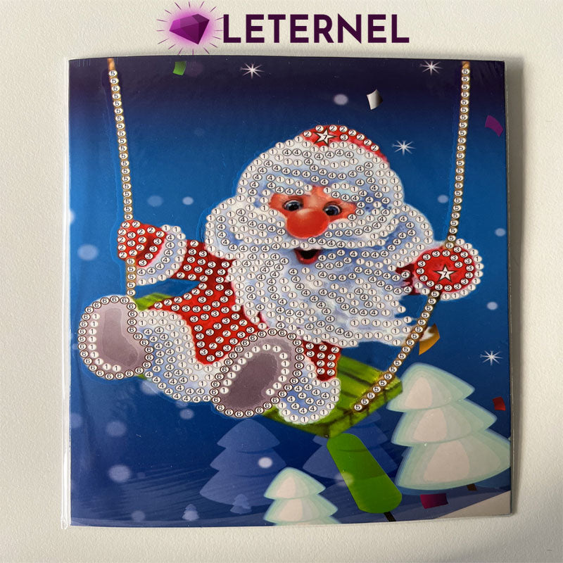 Cartes de Noël à broder - Père Noël balançoire
